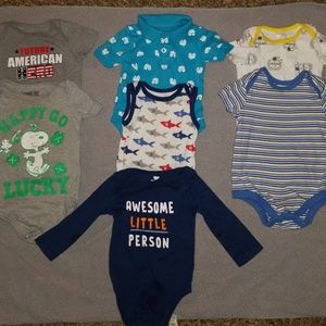 1 tank top, 4 tshirts, 1 polo shirt, 1 long sleeve